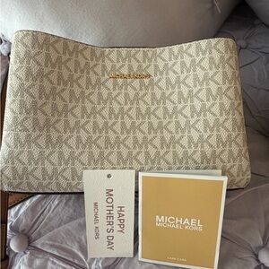 Michael Kors Cream Monogram crossbody purse like new